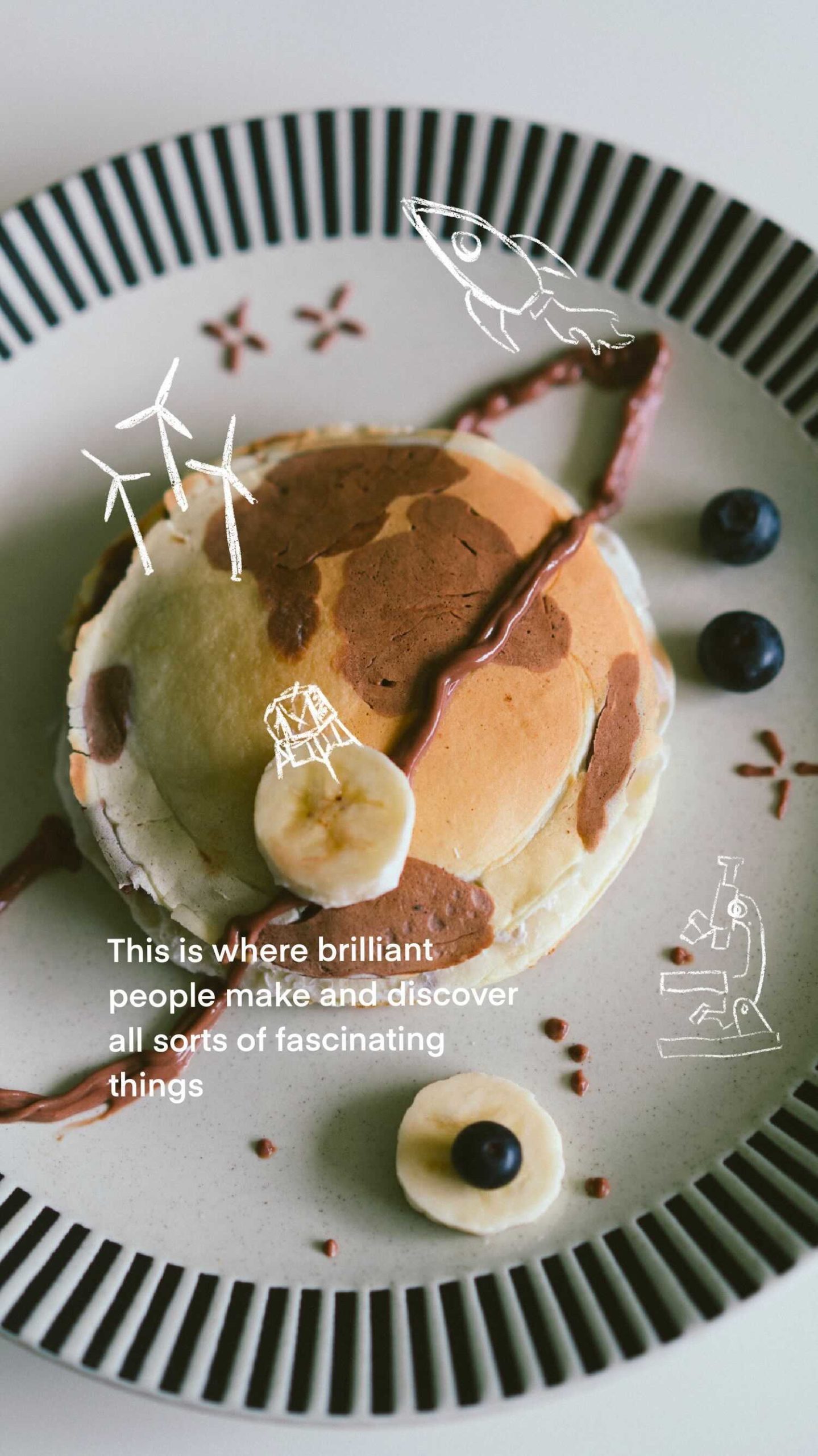 Pancake representing earth with chocolate ring with doodles of microscope and rocket ship quote- This is where brilliant people make and discover all sorts of fascinating things